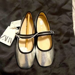 Girls size 12 1/2 shoes from Zara.  Brand new tags still attached.
